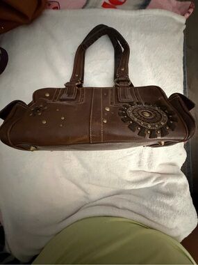 Coach Brown Leather Shoulder Bag with Decorative Stud Accents